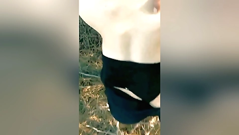 Amateur outdoor sex video filmed by a guy in a black trench coat