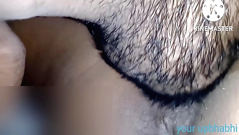 Cute girl in a black dress shows her face on web cam video