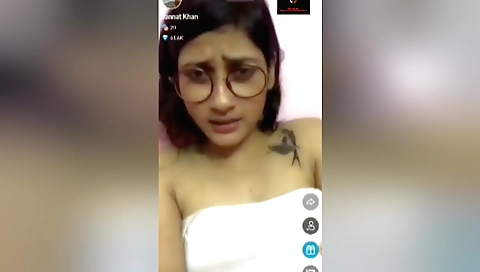 Sexy brunette babe in sexy outfit stretches her body