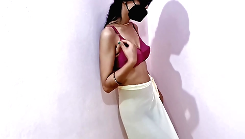 Solo dancing of a sexy brunette with large breasts