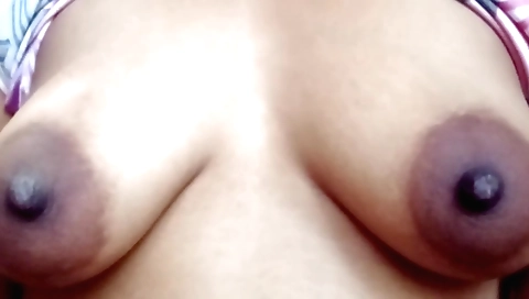 Indian housewife gets naked on the bed before cuming