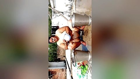 Mature Indian babe in the outdoor bath is getting fucked