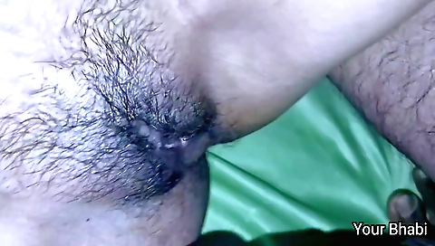 Indian hottie is standing on the bed with her husband