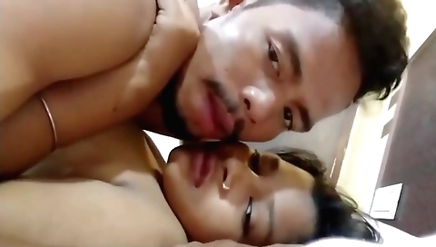 Indian brunette teen making out with a guy on webcam