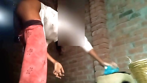 Indian girl is making a roti with her stepsister-in-law