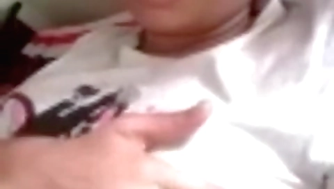 Sexy brunette in a sexy outfit shows her tits on webcam