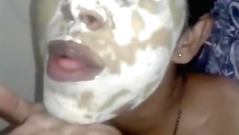 Indian amateur teen in a shower gives a blowjob to her man