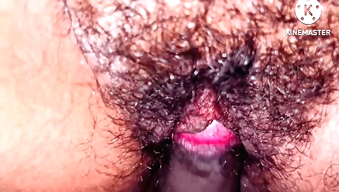 A girl with a hairy pussy takes it on by her stepbrother