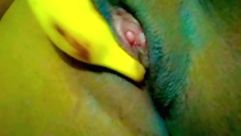 Solo female with a vibrator is using it on her cunt