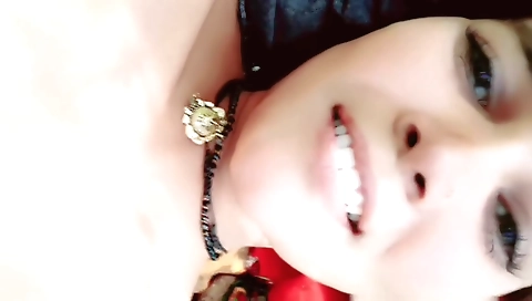 Brunette girl with a great body is filmed outdoors