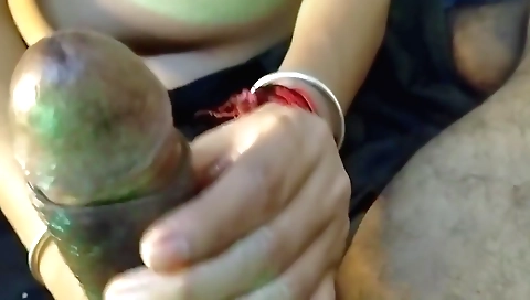 Indian brunette sucking a large dildo in her stepfamily's home