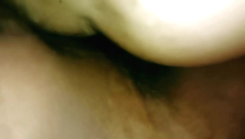 Brunette milf with a sexy face fucking in the bathroom