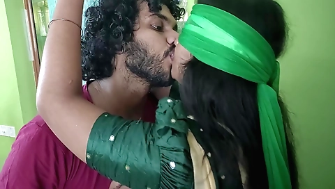 A brunette in a blindfolded state is tied up on the ceiling