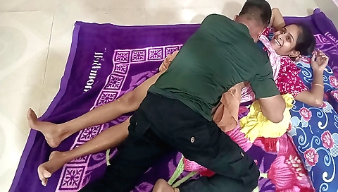 Indian girl in a white dress and stockings in bedroom