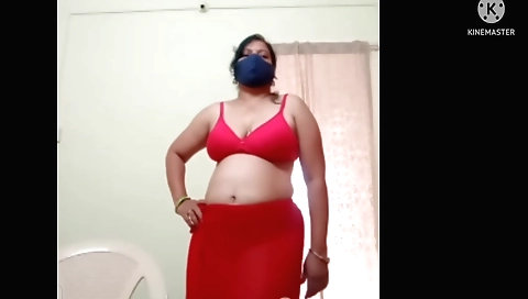 A big booty brunette shows her tits and ass in solo