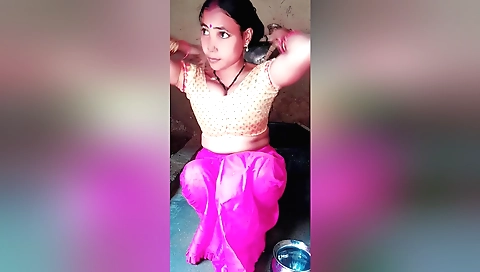 Hot brunette solo bath scene with her tits in the bath