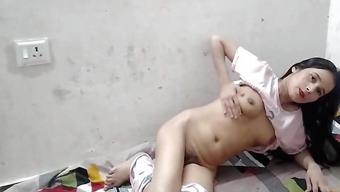 Indian beauty masturbating in a bikini on her back