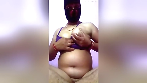 Indian girl with a nice booty rubs and fucks her hairy pussy