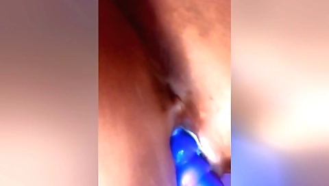 Horny teen masturbates her chubby body with a dildo