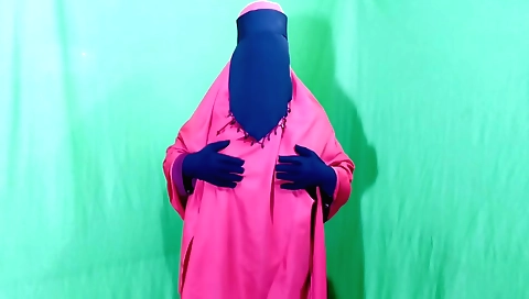 Busty girl in a sexy outfit fucks herself in solo sex video