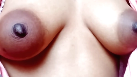 Indian girl plays with her hair and tits in amateur scene