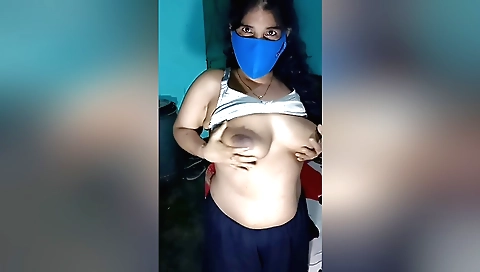 Wife masturbates in the bedroom in homemade solo video