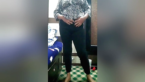 My beautiful girl rubs her clit while standing alone in her room