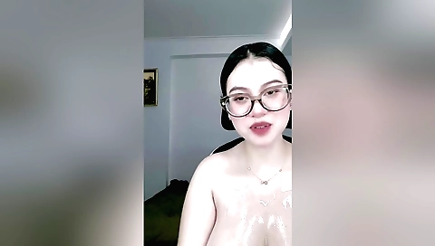 Indian naked woman showing her natural body and oil on face