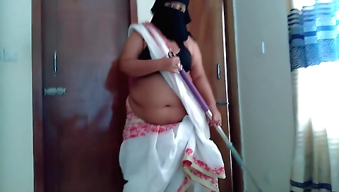 Indian brunette with big boobs plays with a big cock