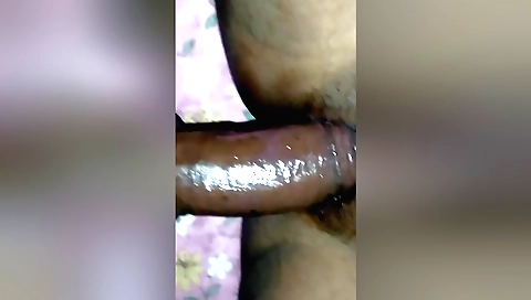 Indian babe gets her dick in her hairy pussy and pussy