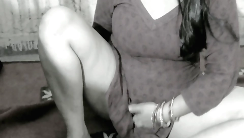 Indian brunette with huge breasts makes it hot solo