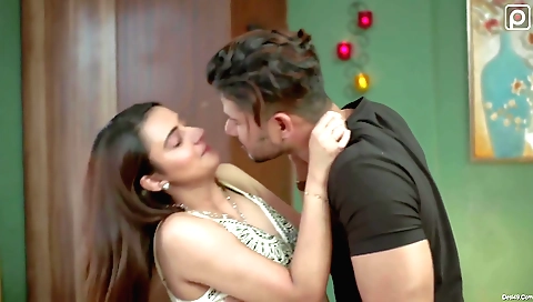 Hot brunette babe with black hair is in her pink dress