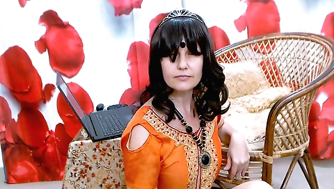 Indian brunette shows off her small tits on webcam