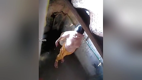 Lovely brunette in a naked shower with a hidden camera