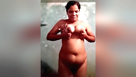 Indian milf showing off her big boobs on the shower