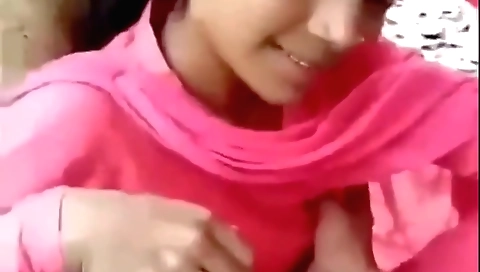 Brunette student is being very horny outdoors in school setting